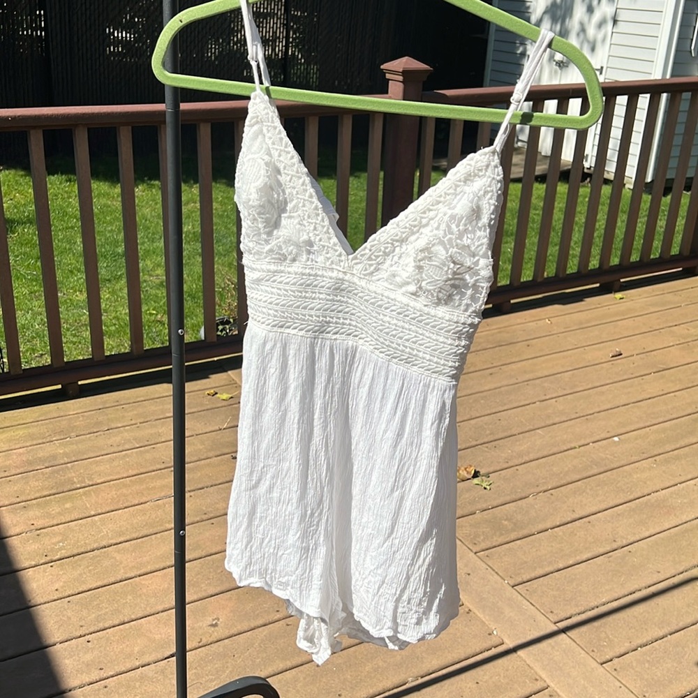 Cute white summery romper/dress from local boutique. Only worn once